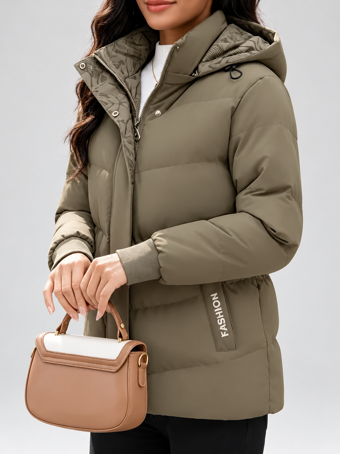 Women's hooded puffer jacket in Khaki – studio view 2