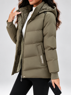 Women's hooded puffer jacket in Khaki – studio view 3