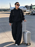 Women's Hooded Co-ord Set with Wide Leg Trousers and Drawstring Waist in Black – Three-Quarter View