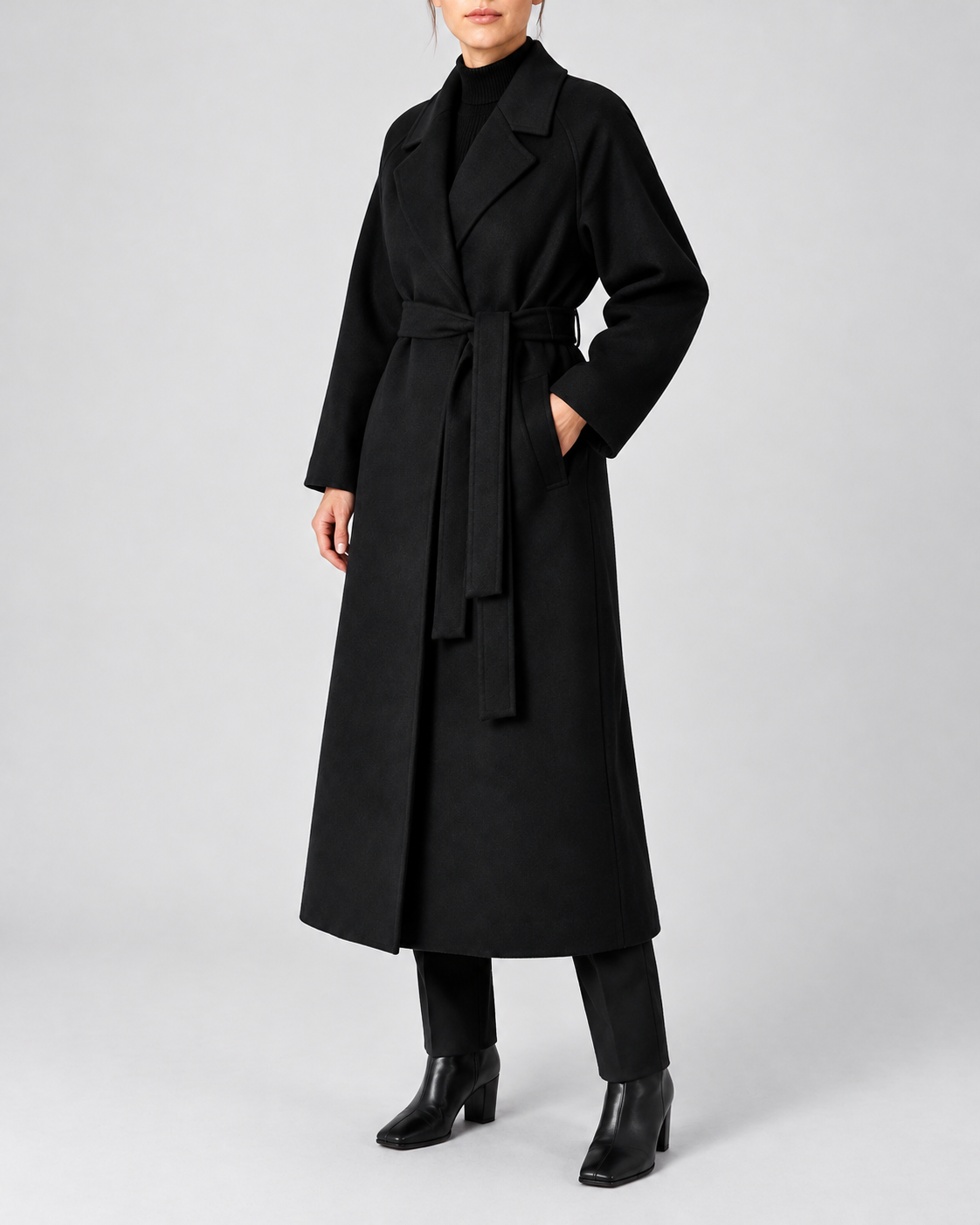 Women's Long Belted Coat with Raglan Sleeves and Side Pockets in Black – Three-Quarter View