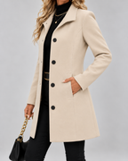 Cream fit and flare wool blend coat pocket detail
