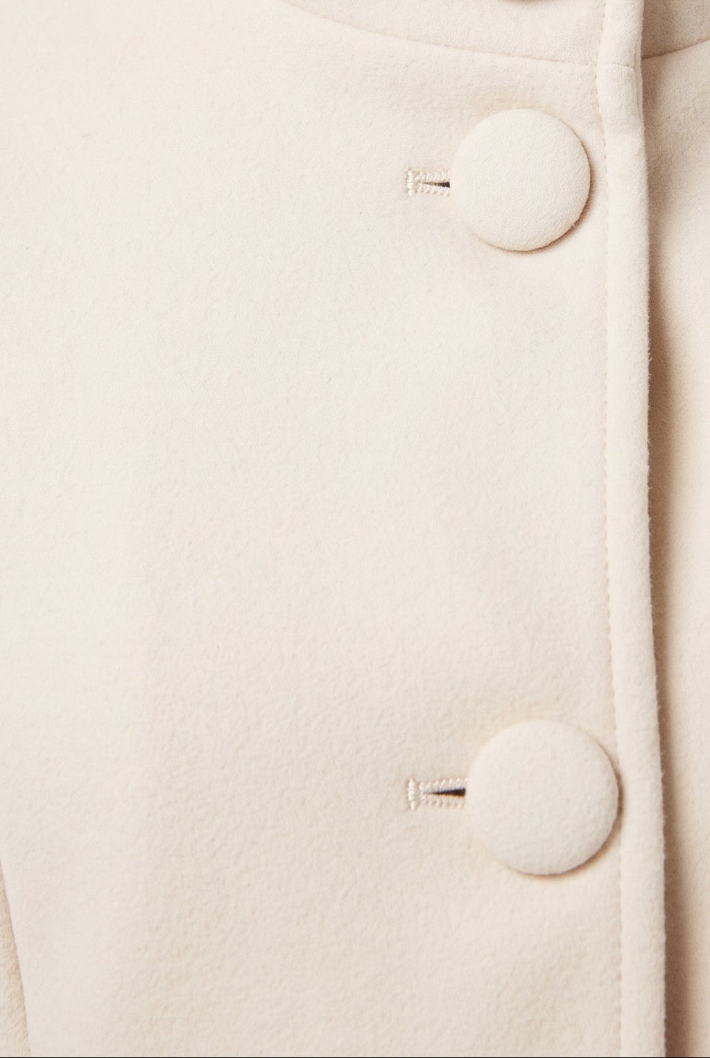 Women's Longline Coat with Funnel Neck and Covered Button Front in White – Detail View