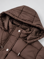 Women's longline hooded puffer coat in Brown – hood detail