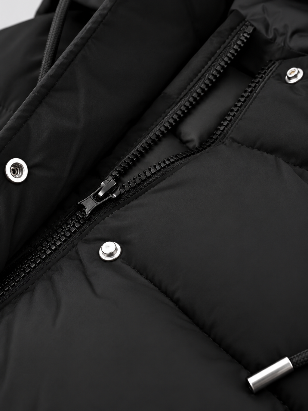 Women's longline hooded puffer coat in Black – zip snap detail