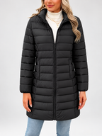 Women's longline puffer coat in black, front view