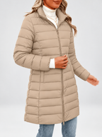 Women's longline puffer coat in khaki, close view of the collar and zip