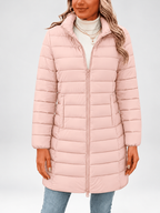 Women's longline puffer coat in light pink, front view