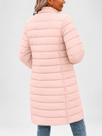 Women's longline puffer coat in light pink, close view of the collar and zip