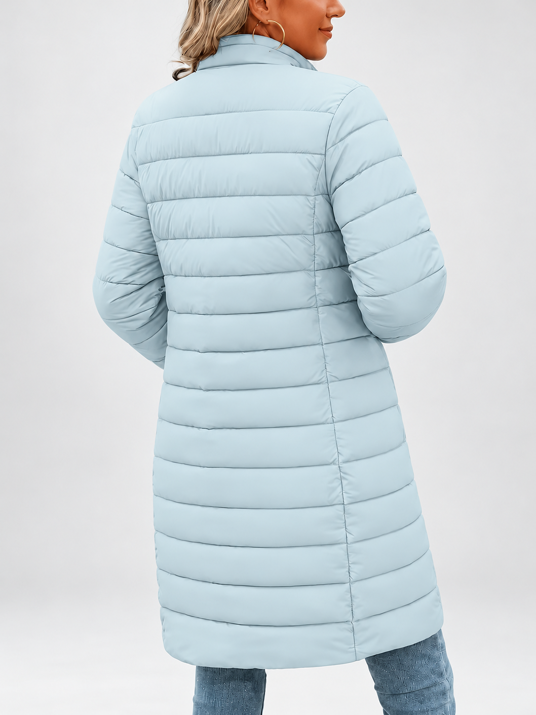 Women's longline puffer coat in sky blue, back view