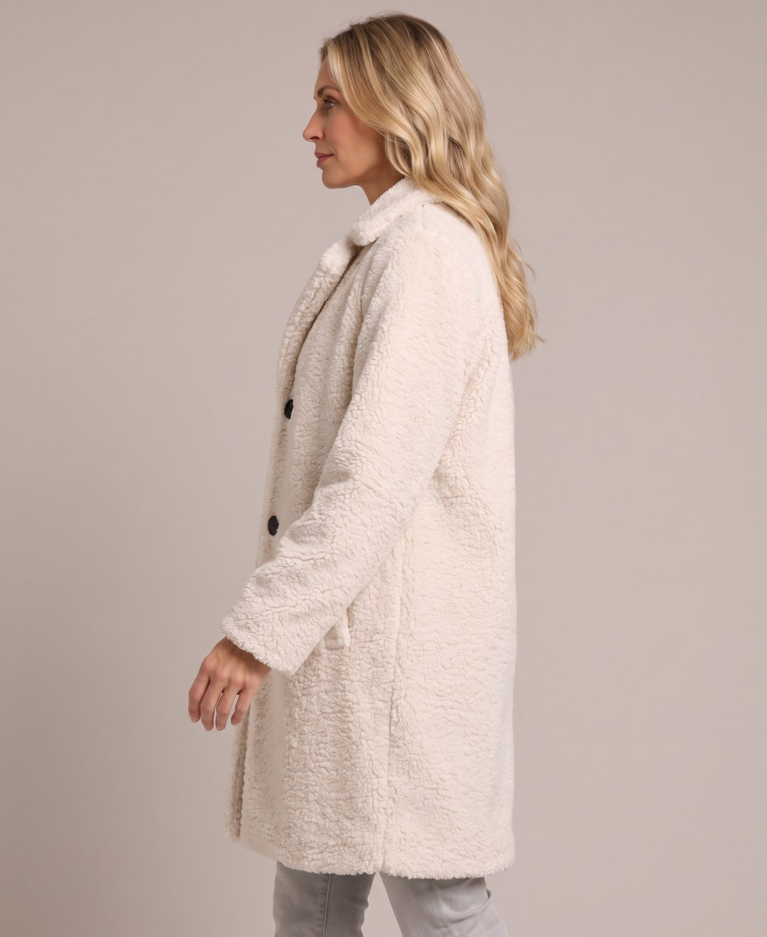 Women's Longline Teddy Coat with Notch Lapels and Single Breasted Button Front in Off White – Side View