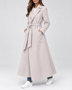 Women's Maxi Belted Coat with Notch Lapels and Patch Pockets in Beige – Three-Quarter View