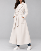 Women's Maxi Belted Coat with Notch Lapels and Patch Pockets in Off White – Three-Quarter View