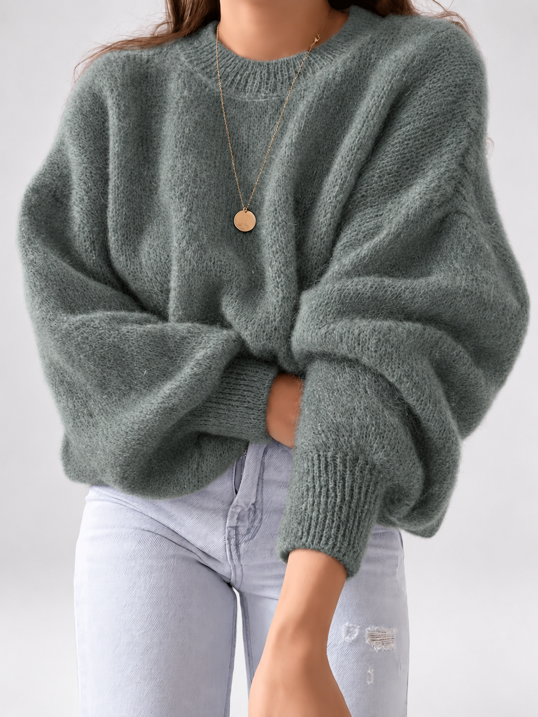 Green women's knitted crew neck jumper — studio view 1