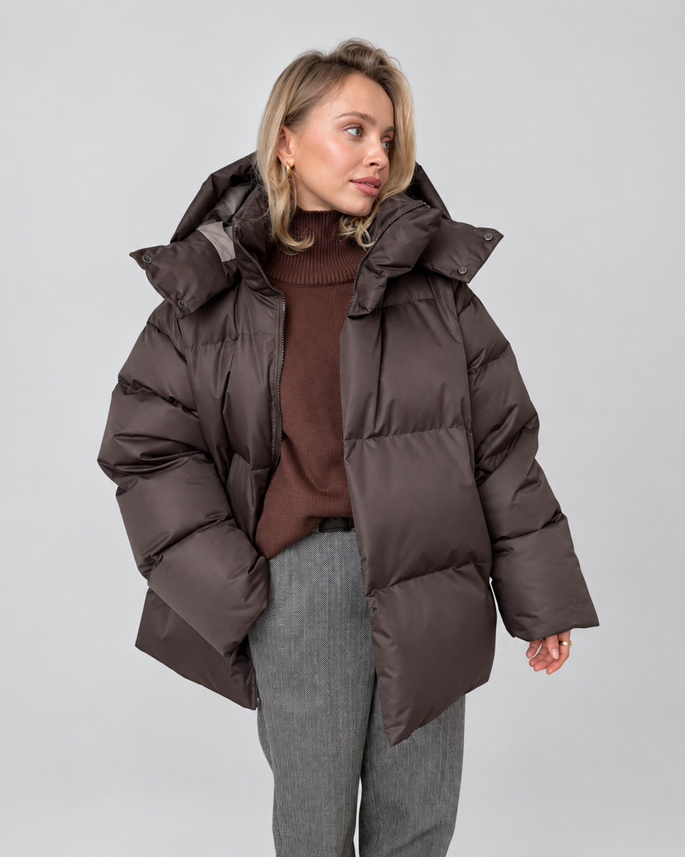 Women's Oversized Hooded Puffer Jacket with High Collar and Wide Quilting in Dark Brown – Front View