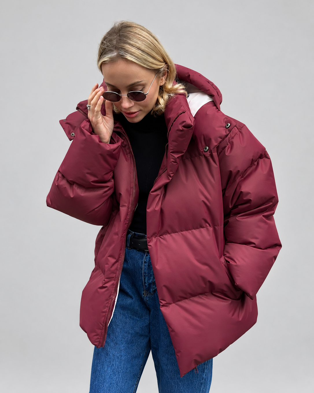 Women's Oversized Hooded Puffer Jacket with High Collar and Wide Quilting in Burgundy – Front View