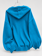 Women's Oversized Knitted Hooded Jumper with Drawstrings and Balloon Sleeves in Blue – Back View