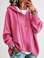 Women's Oversized Knitted Hooded Jumper with Drawstrings and Balloon Sleeves in Dark Pink – Front View