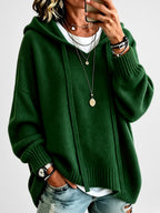 Women's Oversized Knitted Hooded Jumper with Drawstrings and Balloon Sleeves in Green – Front View