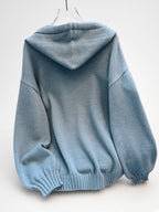 Women's Oversized Knitted Hooded Jumper with Drawstrings and Balloon Sleeves in Military Blue – Back View