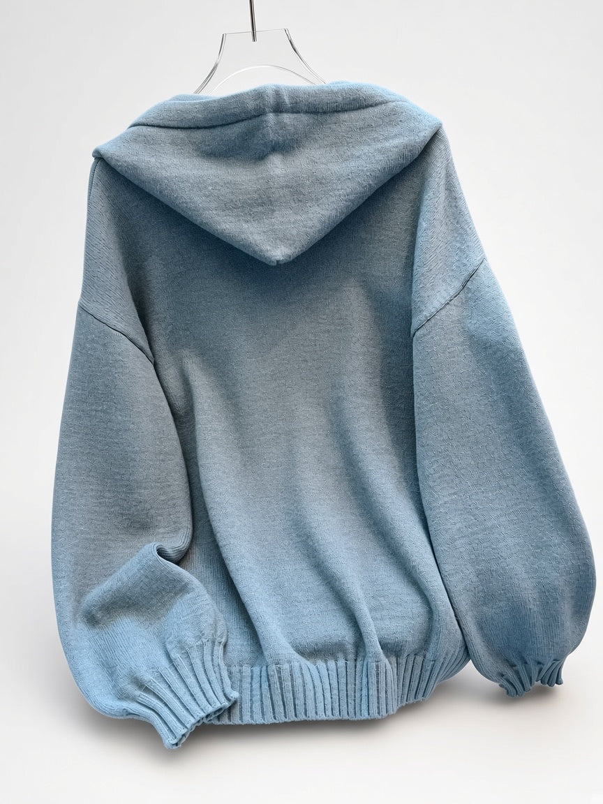 Women's Oversized Knitted Hooded Jumper with Drawstrings and Balloon Sleeves in Military Blue – Back View