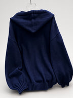 Women's Oversized Knitted Hooded Jumper with Drawstrings and Balloon Sleeves in Navy – Back View