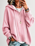 Women's Oversized Knitted Hooded Jumper with Drawstrings and Balloon Sleeves in Pink – Front View