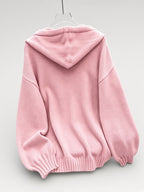 Women's Oversized Knitted Hooded Jumper with Drawstrings and Balloon Sleeves in Pink – Flat Lay