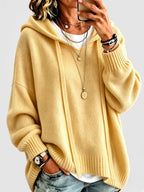 Women's Oversized Knitted Hooded Jumper with Drawstrings and Balloon Sleeves in Yellow – Front View