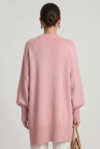 Women's Oversized Knitted Jumper with Crew Neck and Asymmetric Hem