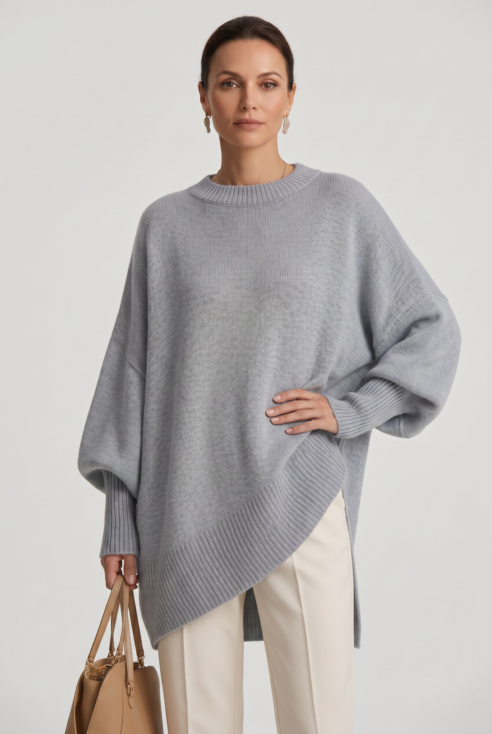Women's Oversized Knitted Jumper with Crew Neck and Asymmetric Hem