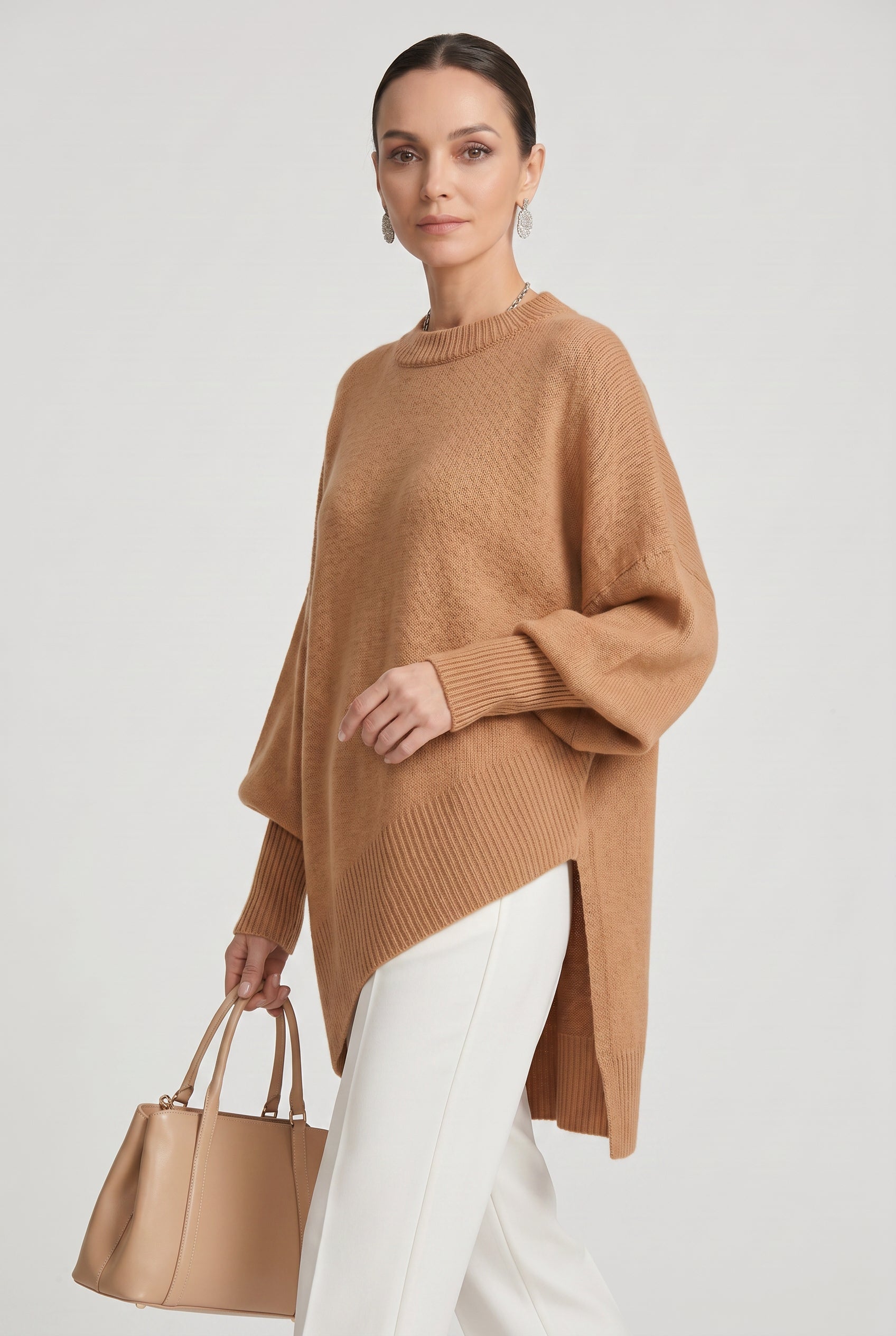 Women's Oversized Knitted Jumper with Crew Neck and Asymmetric Hem