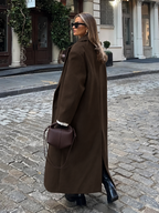 Women's Oversized Long Coat with Double Breasted Front and Notch Lapels in Brown – Side View