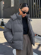 Women's Oversized Puffer Jacket with Detachable Hood and Zip Front
