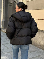 Women's Oversized Puffer Jacket with Detachable Hood and Zip Front