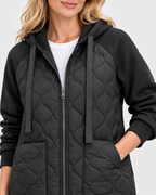 Women's oversized quilted jacket with fleece hood and zip front