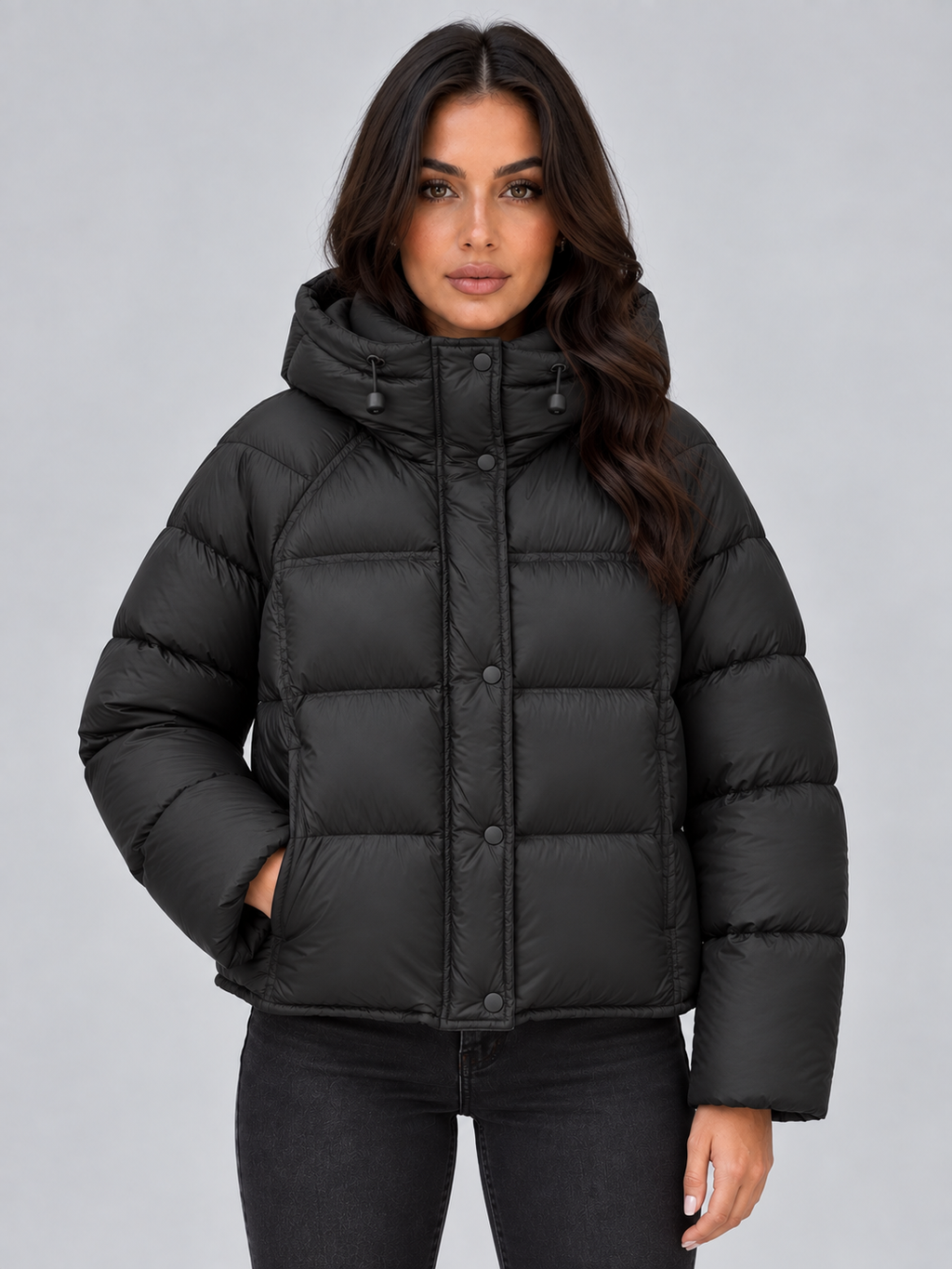 Black oversized hooded puffer jacket detail