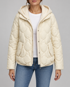 Women's Quilted Jacket with Ribbed Knit Hood and Snap Flap Pockets in Off White – Front View
