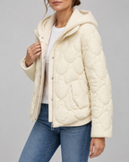 Women's Quilted Jacket with Ribbed Knit Hood and Snap Flap Pockets in Off White – Three-Quarter View