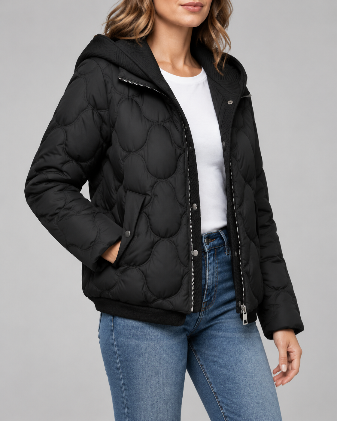 Women's Quilted Jacket with Ribbed Knit Hood and Snap Flap Pockets in Black – Three-Quarter View