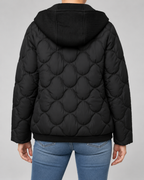 Women's Quilted Jacket with Ribbed Knit Hood and Snap Flap Pockets in Black – Back View
