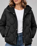 Women's Quilted Jacket with Ribbed Knit Hood and Snap Flap Pockets in Black – Detail