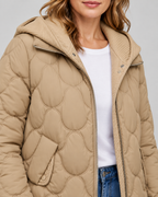 Women's Quilted Jacket with Ribbed Knit Hood and Snap Flap Pockets in Camel – Detail