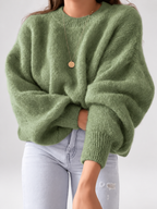 Green women's knitted crew neck jumper — studio view 1