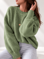 Green women's knitted crew neck jumper — studio view 4