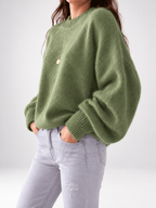 Green women's knitted crew neck jumper — studio view 5