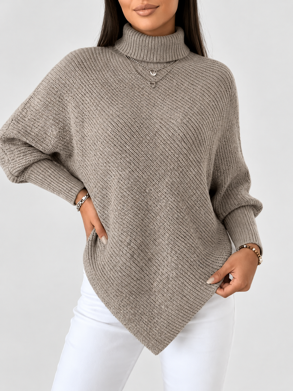 Women's Ribbed Knit Turtleneck Jumper with Batwing Sleeves and Pointed Hem in Taupe – Front View
