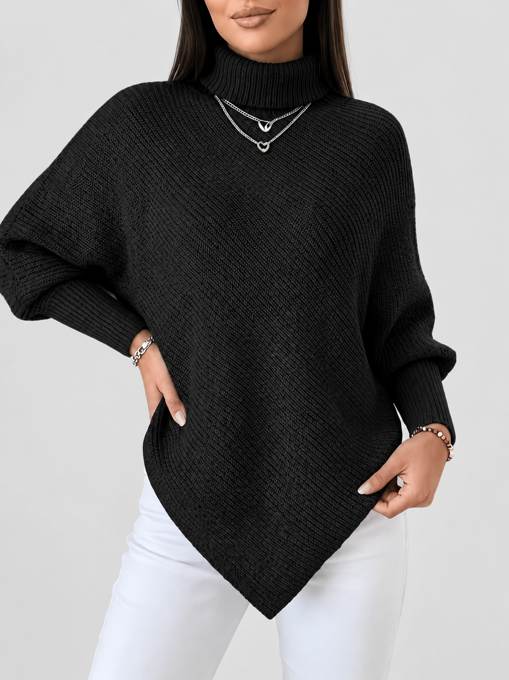 Women's Ribbed Knit Turtleneck Jumper with Batwing Sleeves and Pointed Hem in Black – Front View