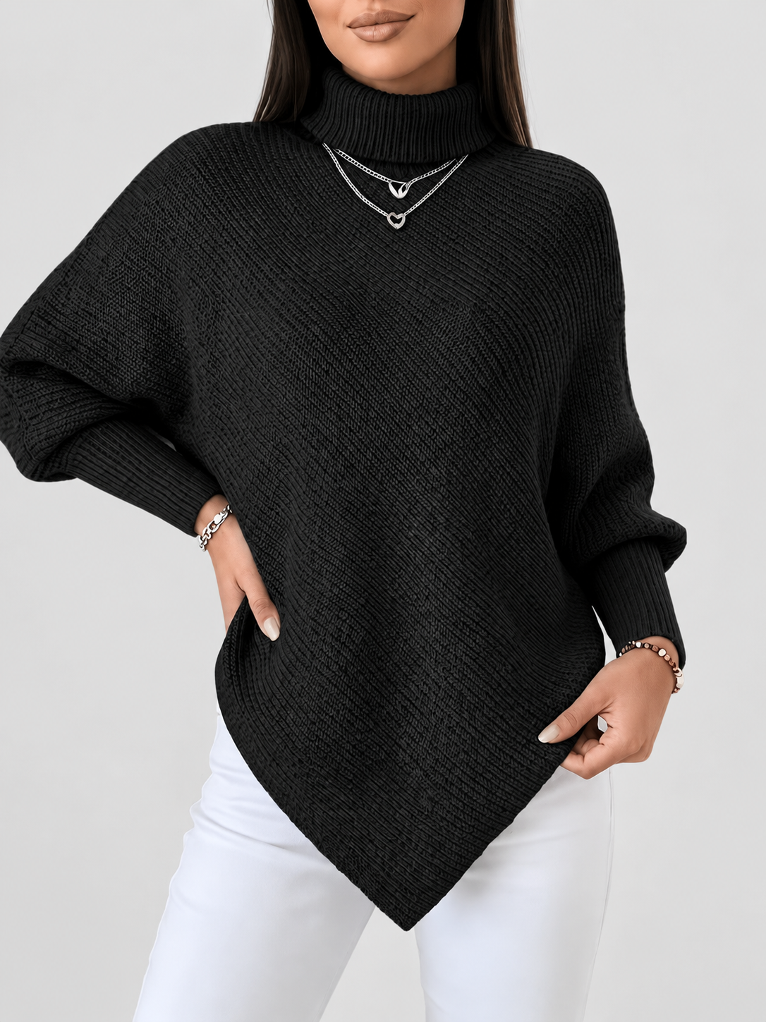 Women's Ribbed Knit Turtleneck Jumper with Batwing Sleeves and Pointed Hem in Black – Front View