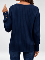 Navy Blue ribbed V-neck jumper with button cuffs, studio image 2