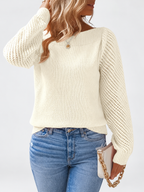 Women's round neck knitted jumper in Apricot, close view with open knit sleeves